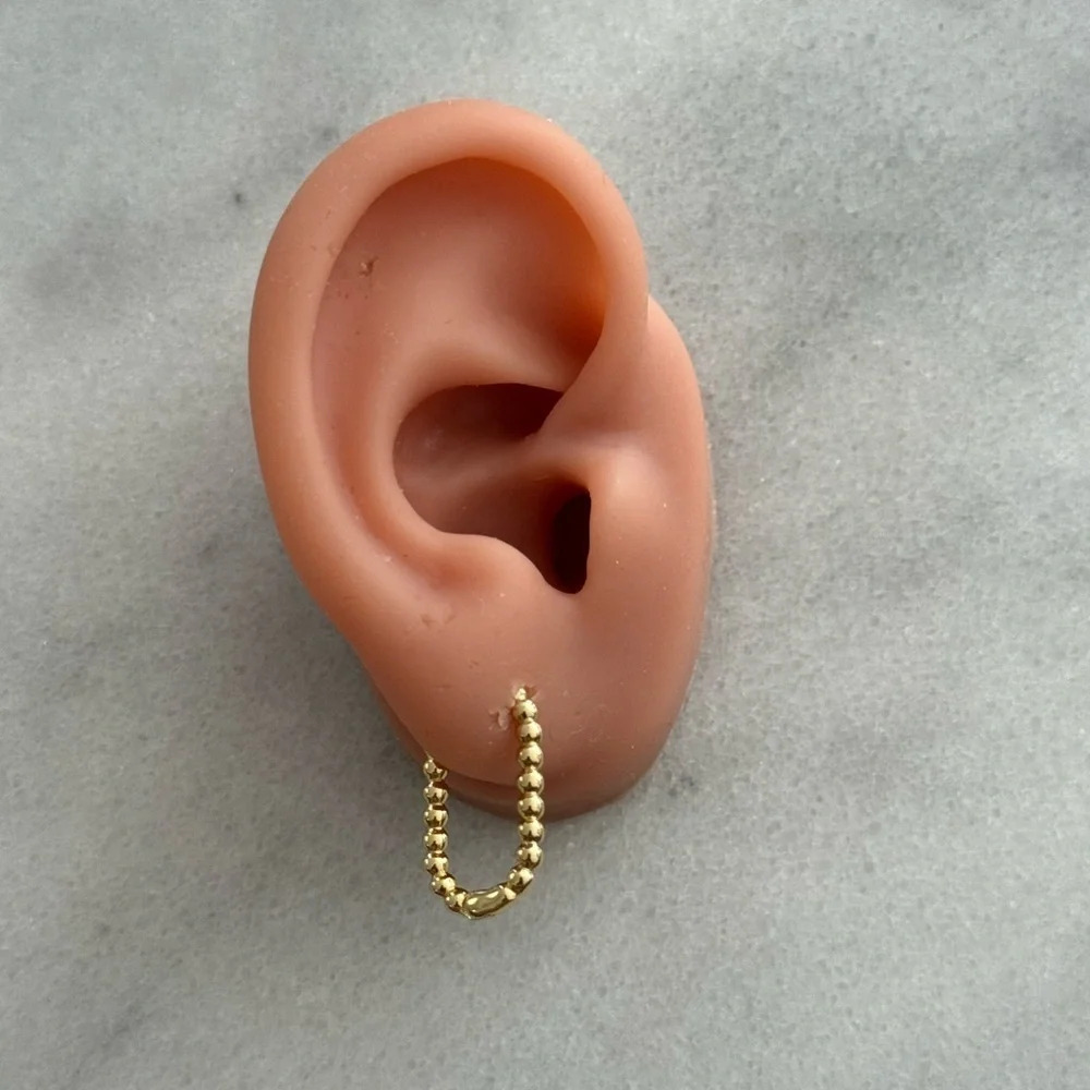 Gold Beaded Oval Hoop Earrings
Brand New - Picture 2 of 3